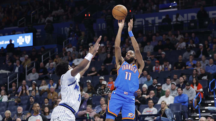Feb 3, 2026; Oklahoma City, Oklahoma, USA; Oklahoma City Thunder guard Isaiah Joe (11) shoots against the Orlando Magic during the second half at Paycom Center.