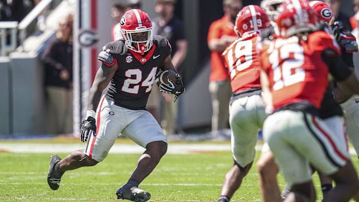 Apr 12, 2025; Athens, GA, USA; Georgia Bulldogs running back Bo Walker (24) runs with the ball during the Georgia Spring game at Sanford Stadium. Mandatory Credit: Dale Zanine-Imagn Images Apr 12, 2025; Athens, GA, USA; Georgia Bulldogs running back Bo Walker (24) runs with the ball during the Georgia Spring game at Sanford Stadium. Mandatory Credit: Dale Zanine-Imagn Images