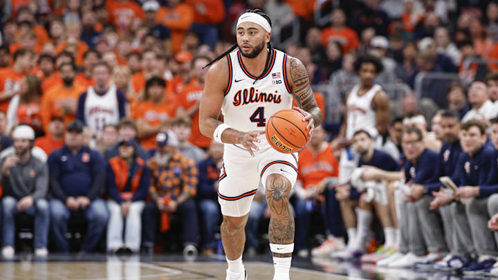 Nov 19, 2025; Chicago, Illinois, USA; Illinois Fighting Illini guard Kylan Boswell (4) brings the ball up court against the Alabama Crimson Tide during the first half at United Center. Mandatory Credit: Kamil Krzaczynski-Imagn Images