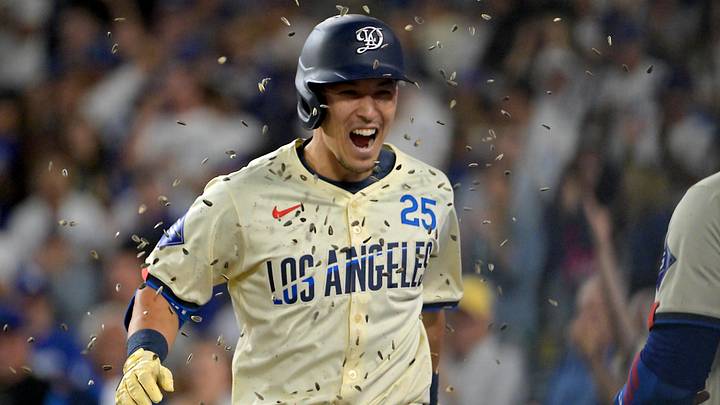 Sep 20, 2025; Los Angeles, California, USA; Los Angeles Dodgers second baseman Tommy Edman (25) is showered with seeds after a solo home run in the fifth inning against the San Francisco Giants at Dodger Stadium. Mandatory Credit: Jayne Kamin-Oncea-Imagn Images Sep 20, 2025; Los Angeles, California, USA; Los Angeles Dodgers second baseman Tommy Edman (25) is showered with seeds after a solo home run in the fifth inning against the San Francisco Giants at Dodger Stadium. Mandatory Credit: Jayne Kamin-Oncea-Imagn Images