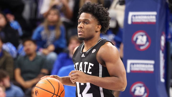 Dec 21, 2024; Memphis, Tennessee, USA; Mississippi State Bulldogs guard Josh Hubbard (12) dribbles the ball against the Memphis Tigers during the second half at FedExForum. Mandatory Credit: Wesley Hale-Imagn Images