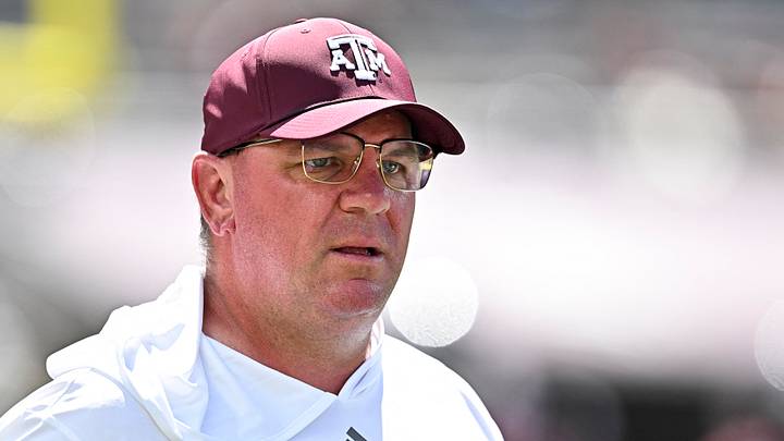 Texas A&M Aggies head coach Mike Elko walk on the field prior to the game against the Kentucky Wildcats at Kyle Field. Texas A&M Aggies head coach Mike Elko walk on the field prior to the game against the Kentucky Wildcats at Kyle Field.