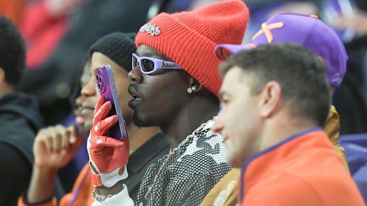 New York Yankees third baseman Jazz Chisholm Jr. watches Clemson beat Syracuse near baseball coach Erik Bakich during the second half at Littlejohn Coliseum in Clemson, S.C Wednesday, January 22, 2025. New York Yankees third baseman Jazz Chisholm Jr. watches Clemson beat Syracuse near baseball coach Erik Bakich during the second half at Littlejohn Coliseum in Clemson, S.C Wednesday, January 22, 2025.