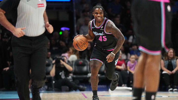 Jan 4, 2026; Miami, Florida, USA;  Miami Heat guard Davion Mitchell (45) brings the ball up the court against the New Orleans Pelicans in the first half at Kaseya Center. Mandatory Credit: Jim Rassol-Imagn Images