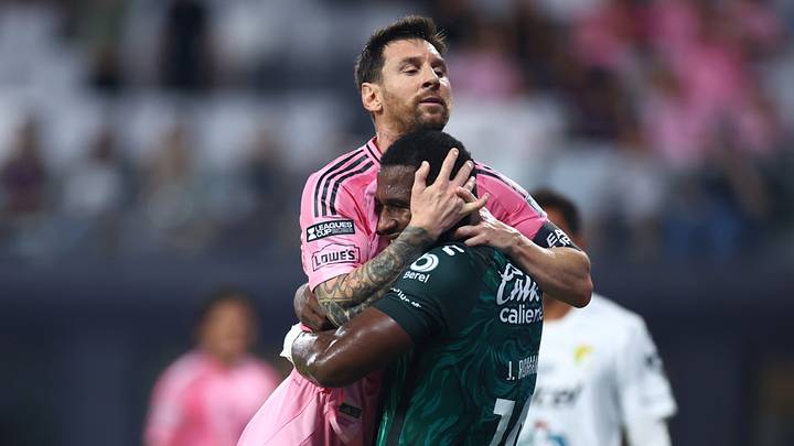 Club León center back Jhohan Romaña embraces Inter Miami captain Lionel Messi during the second half of the clubs' Leagues Cup match Wednesday. Club León center back Jhohan Romaña embraces Inter Miami captain Lionel Messi during the second half of the clubs' Leagues Cup match Wednesday.