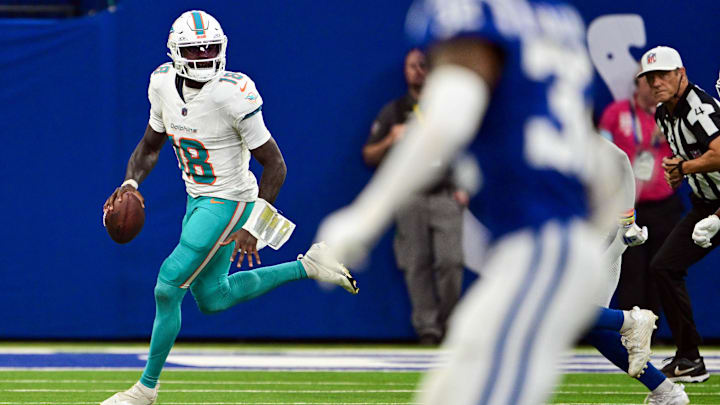 Miami Dolphins quarterback Tyler Huntley (18) looks for an open teammate during the second half against the Indianapolis Colts at Lucas Oil Stadium. Miami Dolphins quarterback Tyler Huntley (18) looks for an open teammate during the second half against the Indianapolis Colts at Lucas Oil Stadium.