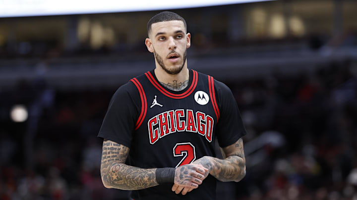 Dec 6, 2024; Chicago, Illinois, USA; Chicago Bulls guard Lonzo Ball (2) walks back to the bench during the first half at United Center. 