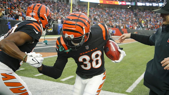 Dec 10, 2023; Cincinnati, Ohio, USA; Cincinnati Bengals cornerback DJ Ivey (38) celebrates his fumble recovery with cornerback Chidobe Awuzie (22) during the second half against the Indianapolis Colts at Paycor Stadium. Mandatory Credit: Joseph Maiorana-Imagn Images Dec 10, 2023; Cincinnati, Ohio, USA; Cincinnati Bengals cornerback DJ Ivey (38) celebrates his fumble recovery with cornerback Chidobe Awuzie (22) during the second half against the Indianapolis Colts at Paycor Stadium. Mandatory Credit: Joseph Maiorana-Imagn Images