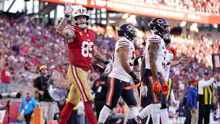 George Kittle signals first down after one of his six receptions in Sunday's 38-13 blowout win over the Bears.