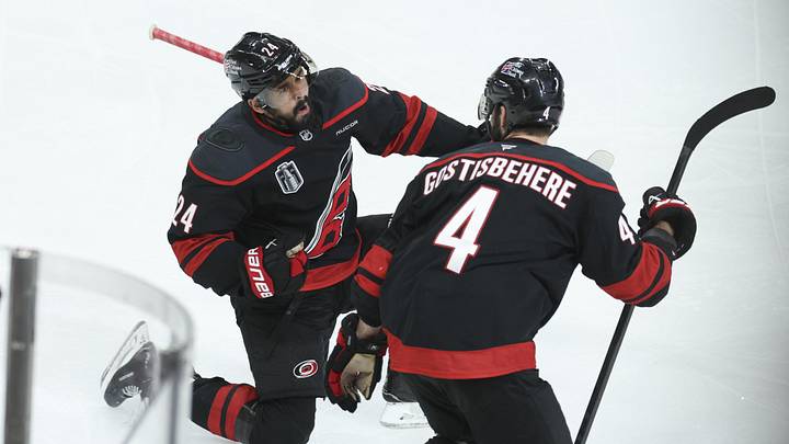 Jun 4, 2026; Raleigh, North Carolina, USA; Carolina Hurricanes right wing Seth Jarvis (24) celebrates scoring in overtime with defenseman Shayne Gostisbehere (4) against the Vegas Golden Knights in game two of the 2026 Stanley Cup Final at Lenovo Center. Mandatory Credit: Nathan Ray Seebeck-Imagn Images