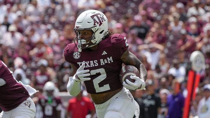Sep 6, 2025; College Station, Texas, USA; Texas A&M Aggies wide receiver Terry Bussey (2) runs with the football during the second half against the Utah State Aggies at Kyle Field. Mandatory Credit: Sean Thomas-Imagn Images