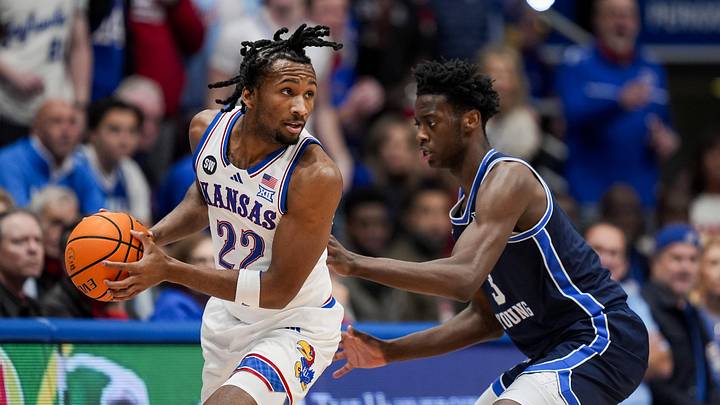 Jan 24, 2026; Columbia, Missouri, USA; Kansas Jayhawks guard Darryn Peterson (22) looks to pass against BYU Cougars forward AJ Dybantsa (3) during the first half at Mizzou Arena. Mandatory Credit: Jay Biggerstaff-Imagn Images Jan 24, 2026; Columbia, Missouri, USA; Kansas Jayhawks guard Darryn Peterson (22) looks to pass against BYU Cougars forward AJ Dybantsa (3) during the first half at Mizzou Arena. Mandatory Credit: Jay Biggerstaff-Imagn Images
