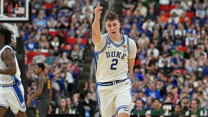 Mar 23, 2025; Raleigh, NC, USA; Duke Blue Devils forward Cooper Flagg (2) reacts after scoring a 3 pointer during the first half against the Baylor Bears in the second round of the NCAA Tournament at Lenovo Center. Mandatory Credit: Zachary Taft-Imagn Images