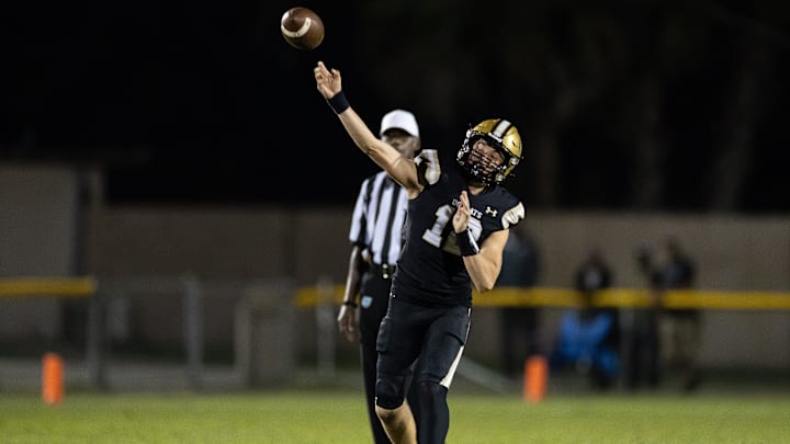 Buchholz Bobcats quarterback Trace Johnson (12) throws the ball against the Tocoi Creek Toros during the first half at Citizens Field in Gainesville, FL on Monday, October 14, 2024. [Matt Pendleton/Gainesville Sun]