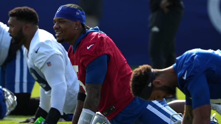 Indianapolis Colts quarterback Anthony Richardson (5) stretches during the first day of the Indianapolis Colts’ training camp Thursday, July 25, 2024, at Grand Park Sports Complex in Westfield. Indianapolis Colts quarterback Anthony Richardson (5) stretches during the first day of the Indianapolis Colts’ training camp Thursday, July 25, 2024, at Grand Park Sports Complex in Westfield.