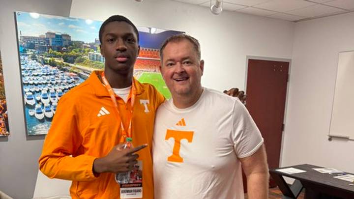Jeremiah Figaro shares a moment with Josh Heupel. Jeremiah Figaro shares a moment with Josh Heupel.