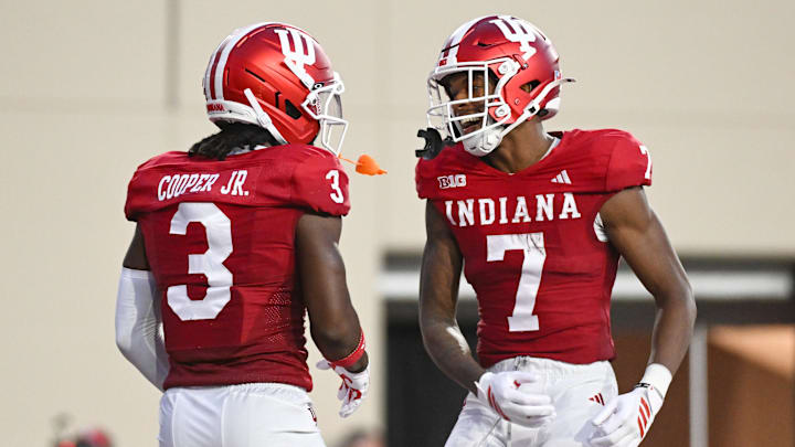 Sep 12, 2025; Bloomington, Indiana, USA; Indiana Hoosiers wide receivers Omar Cooper Jr. (3) and E.J. Williams Jr. (7) celebrate after a touchdown during the first half against the Indiana State Sycamores at Memorial Stadium. Mandatory Credit: Robert Goddin-Imagn Images