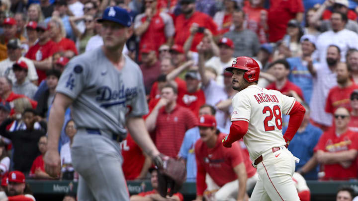 Jun 7, 2025; St. Louis, Missouri, USA;  St. Louis Cardinals pinch hitter Nolan Arenado (28) looks on after hitting a walk-off one run single off of Los Angeles Dodgers relief pitcher Ben Casparius (78) during the ninth inning at Busch Stadium. Mandatory Credit: Jeff Curry-Imagn Images