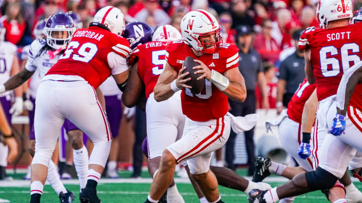 Oct 21, 2023; Lincoln, Nebraska, USA; Nebraska Cornhuskers quarterback Heinrich Haarberg (10) runs with the ball against the Northwestern Wildcats during the third quarter at Memorial Stadium. Oct 21, 2023; Lincoln, Nebraska, USA; Nebraska Cornhuskers quarterback Heinrich Haarberg (10) runs with the ball against the Northwestern Wildcats during the third quarter at Memorial Stadium.