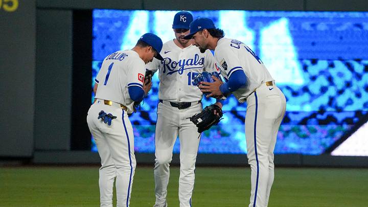 May 4, 2026; Kansas City, Missouri, USA; Kansas City Royals left fielder Isaac Collins (1) and center fielder Lane Thomas (15) and right fielder Jac Caglianone (14) celebrate in the outfield after the win over the Cleveland Guardians at Kauffman Stadium. Mandatory Credit: Denny Medley-Imagn Images