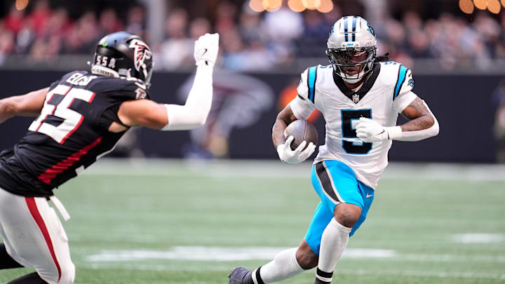 Nov 16, 2025; Atlanta, Georgia, USA;  Carolina Panthers running back Rico Dowdle (5) runs with the ball in the first quarter against the Atlanta Falcons at Mercedes-Benz Stadium. Mandatory Credit: Dale Zanine-Imagn Images