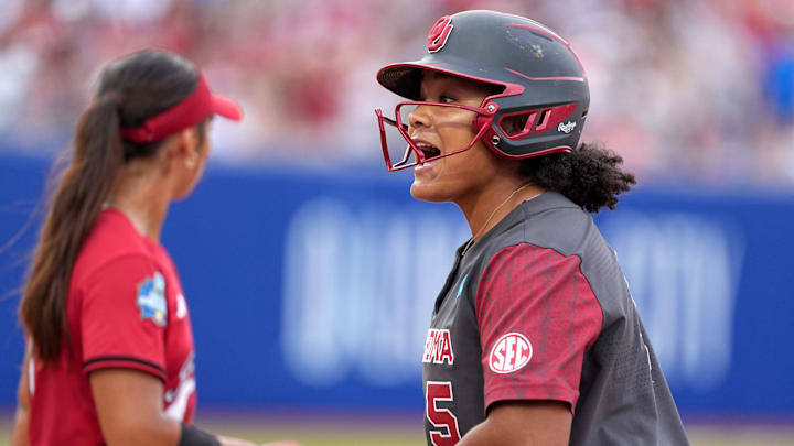 Oklahoma slugger Ella Parker celebrates after a hit at the 2025 WCWS.