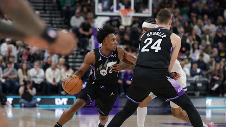 Jan 30, 2025; Salt Lake City, Utah, USA;  Utah Jazz guard Collin Sexton (2) uses center Walker Kessler (24) to get away from Minnesota Timberwolves guard Nickeil Alexander-Walker (9) during the first quarter at Delta Center. Mandatory Credit: Chris Nicoll-Imagn Images