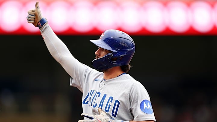 Chicago Cubs shortstop Dansby Swanson salutes Cubs fans at Wrigley Field. Chicago Cubs shortstop Dansby Swanson salutes Cubs fans at Wrigley Field.