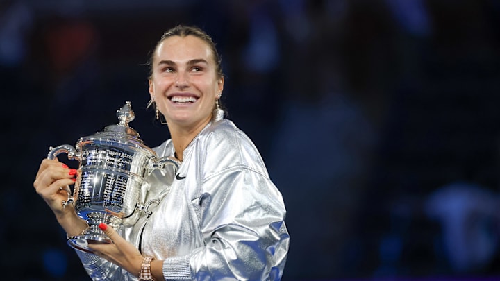 Sep 6, 2025; Flushing, NY, USA; Aryna Sabalenka celebrates with the championship trophy after winning the women's singles final at the 2025 US Open tennis championships.