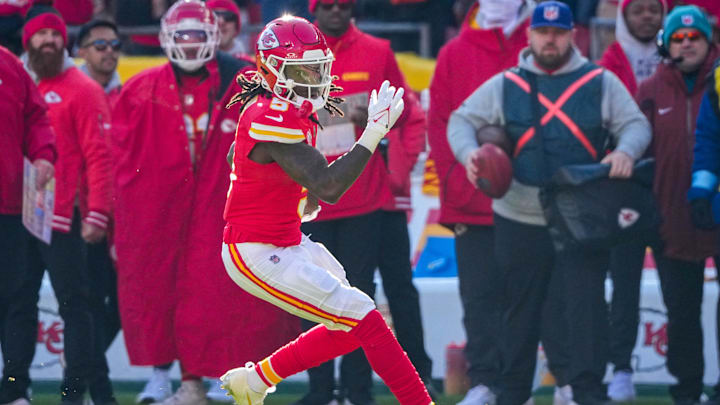 Dec 21, 2024; Kansas City, Missouri, USA; Kansas City Chiefs wide receiver Hollywood Brown (5) runs the ball against the Houston Texans during the first half at GEHA Field at Arrowhead Stadium. Mandatory Credit: Denny Medley-Imagn Images