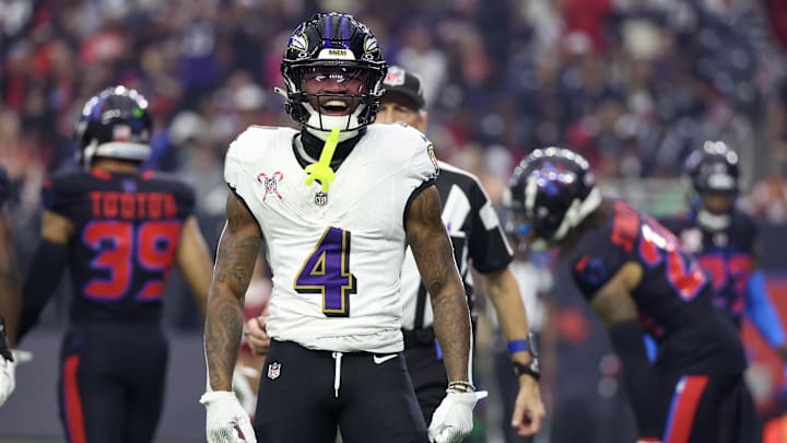 Dec 25, 2024; Houston, Texas, USA; Baltimore Ravens wide receiver Zay Flowers (4) reacts after his first down catch against the Houston Texans  in the first quarter at NRG Stadium. Mandatory Credit: Thomas Shea-Imagn Images