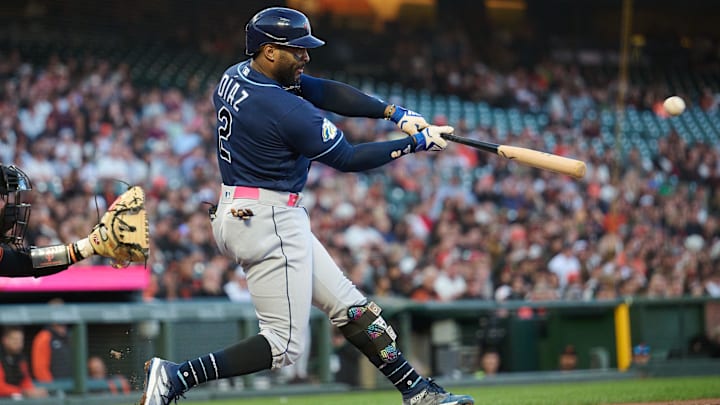 Aug 14, 2023; San Francisco, California, USA; Tampa Bay Rays infielder Yandy Diaz (2) hits an RBI double against the San Francisco Giants during the fourth inning at Oracle Park.