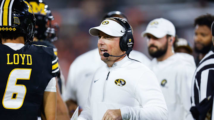 Missouri Tigers head coach Eli Drinkwitz talks to his team during a timeout during the first quarter of the TaxSlayer Gator Bowl at EverBank Stadium Saturday December 27, 2025 in Jacksonville, Fla. [Doug Engle/Florida Times-Union]