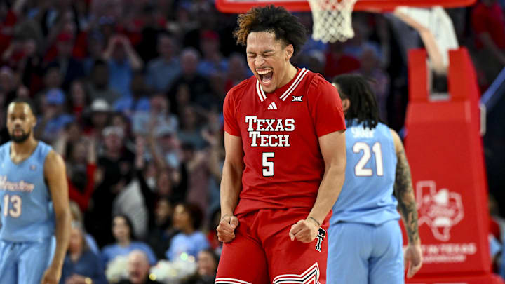 Feb 1, 2025; Houston, Texas, USA; Texas Tech Red Raiders forward Darrion Williams (5) reacts after shooting a three point basket to tie the game with seconds left on the clock against the Houston Cougars at Fertitta Center. Mandatory Credit: Maria Lysaker-Imagn Images 