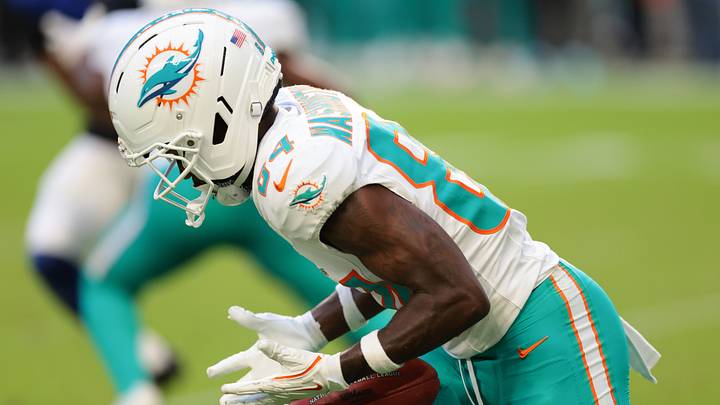 Miami Dolphins wide receiver Tahj Washington (84) muffs a punt return against the New York Giants during the second half at Hard Rock Stadium. Miami Dolphins wide receiver Tahj Washington (84) muffs a punt return against the New York Giants during the second half at Hard Rock Stadium.
