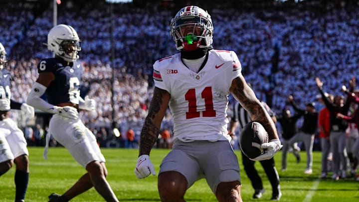 Ohio State Buckeyes wide receiver Brandon Inniss (11) celebrates a touchdown catch during the first half of the NCAA football game against the Penn State Nittany Lions at Beaver Stadium in University Park, Pa. on Saturday, Nov. 2, 2024.
