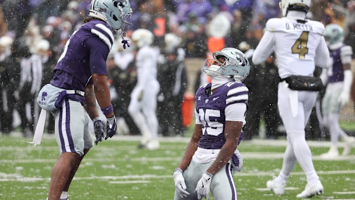 Nov 29, 2025; Manhattan, Kansas, USA; Kansas State Wildcats cornerback Zashon Rich (25) and safety Qua Moss (6) celebrate a stop during the first quarter against the Colorado Buffaloes at Bill Snyder Family Football Stadium. Nov 29, 2025; Manhattan, Kansas, USA; Kansas State Wildcats cornerback Zashon Rich (25) and safety Qua Moss (6) celebrate a stop during the first quarter against the Colorado Buffaloes at Bill Snyder Family Football Stadium.