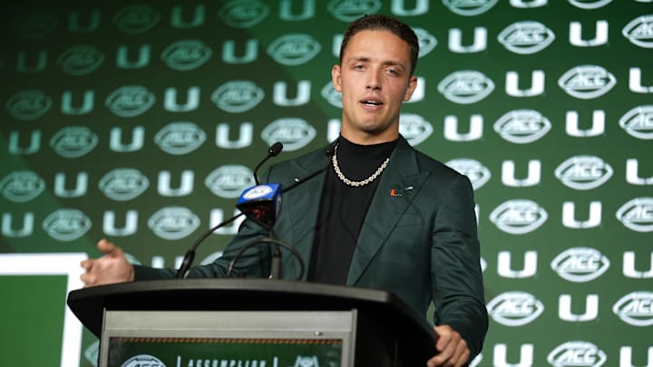 Jul 22, 2025; Charlotte, NC, USA; Miami quarterback Carson Beck answers questions from the media during ACC Media Days at Hilton Charlotte Uptown. Mandatory Credit: Jim Dedmon-Imagn Images