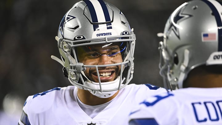 Jan 8, 2022; Philadelphia, Pennsylvania, USA;  Dallas Cowboys quarterback Dak Prescott (4) speaks with  wide receiver Amari Cooper (19) during the game against the Philadelphia Eagles at Lincoln Financial Field. Mandatory Credit: Tommy Gilligan-Imagn Images