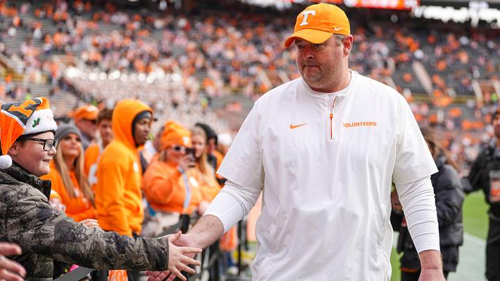 Tennessee coach Josh Heupel high-fives children from East Tennessee Children's Hospital during warm-ups at a NCAA football game between Tennessee and Vanderbilt at Neyland Stadium in Knoxville, Tenn., on Nov. 29, 2025.