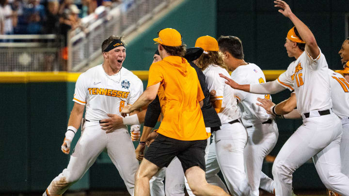 Jun 14, 2024; Omaha, NE, USA; The Tennessee Volunteers celebrate after a walk off single by left fielder Dylan Dreiling (8) against the Florida State Seminoles at Charles Schwab Filed Omaha. Mandatory Credit: Dylan Widger-USA TODAY Sports Jun 14, 2024; Omaha, NE, USA; The Tennessee Volunteers celebrate after a walk off single by left fielder Dylan Dreiling (8) against the Florida State Seminoles at Charles Schwab Filed Omaha. Mandatory Credit: Dylan Widger-USA TODAY Sports