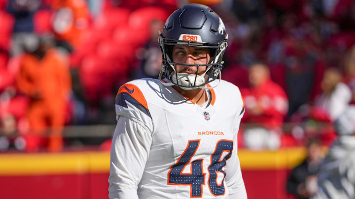 Nov 10, 2024; Kansas City, Missouri, USA; Denver Broncos long snapper Mitchell Fraboni (48) warms up against the Kansas City Chiefs prior to a game at GEHA Field at Arrowhead Stadium. 