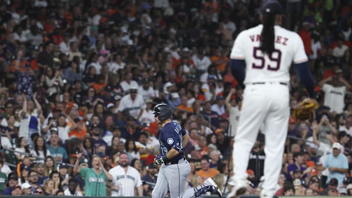 Sep 20, 2025; Houston, Texas, USA; Houston Astros starting pitcher Framber Valdez (59) reacts and Seattle Mariners catcher Cal Raleigh (29) rounds the bases after hitting a home run during the third inning at Daikin Park.
