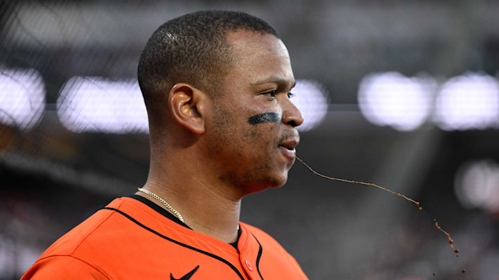 Jun 20, 2025; San Francisco, California, USA; San Francisco Giants designated hitter Rafael Devers (16) spits while in the dugout against the Boston Red Sox in the fourth inning at Oracle Park. Mandatory Credit: Eakin Howard-Imagn Images