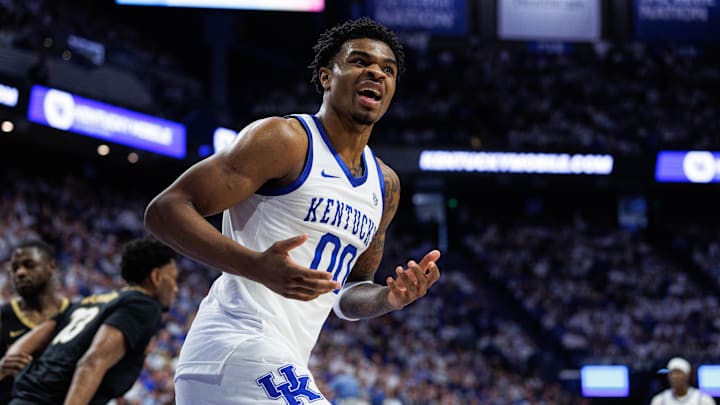Feb 28, 2026; Lexington, Kentucky, USA; Kentucky Wildcats guard Otega Oweh (00) reacts towards a referee after a play against the Vanderbilt Commodores at Rupp Arena at Central Bank Center. Mandatory Credit: Jordan Prather-Imagn Images