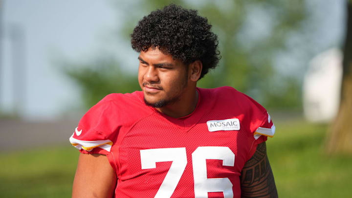 Jul 22, 2024; St. Joseph, MO, USA; Kansas City Chiefs offensive tackle Kingsley Suamataia (76) walks down the hill from the locker room to the fields prior to training camp at Missouri Western State University. Mandatory Credit: Denny Medley-Imagn Images