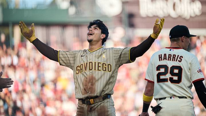 Sep 13, 2026; San Francisco, California, USA; San Diego Padres catcher Ethan Salas (8) reacts at third base after hitting a triple against San Francisco Giants starting pitcher Logan Webb (not pictured) during the fourth inning at Oracle Park. Mandatory Credit: Robert Edwards-Imagn Images Sep 13, 2026; San Francisco, California, USA; San Diego Padres catcher Ethan Salas (8) reacts at third base after hitting a triple against San Francisco Giants starting pitcher Logan Webb (not pictured) during the fourth inning at Oracle Park. Mandatory Credit: Robert Edwards-Imagn Images