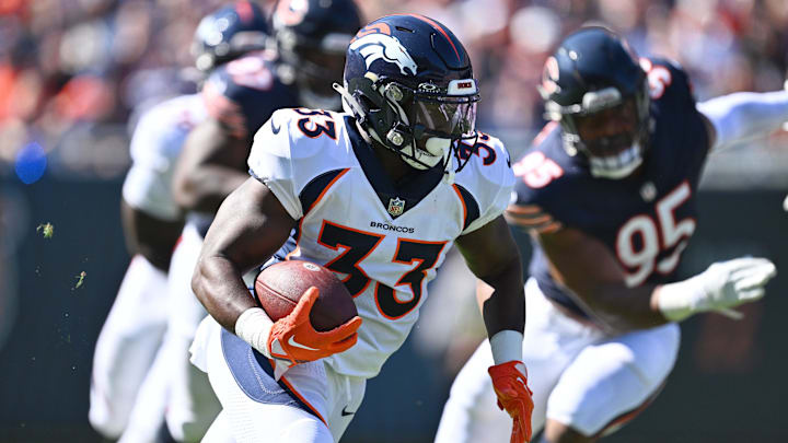 Oct 1, 2023; Chicago, Illinois, USA;  Denver Broncos running back Javonte Williams (33) looks for
