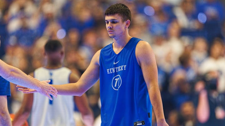 Oct 11, 2024; Lexington, KY, USA; Kentucky Wildcats guard Kerr Kriisa (77) fives teammates during Big Blue Madness at Rupp Arena at Central Bank Center. Mandatory Credit: Jordan Prather-Imagn Images