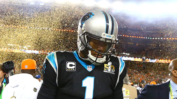 Confetti falls as Carolina Panthers quarterback Cam Newton (1) reacts during his walk off the field